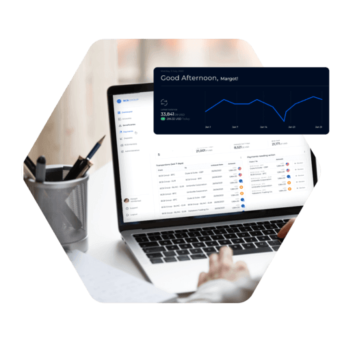 Person using laptop with data dashboard